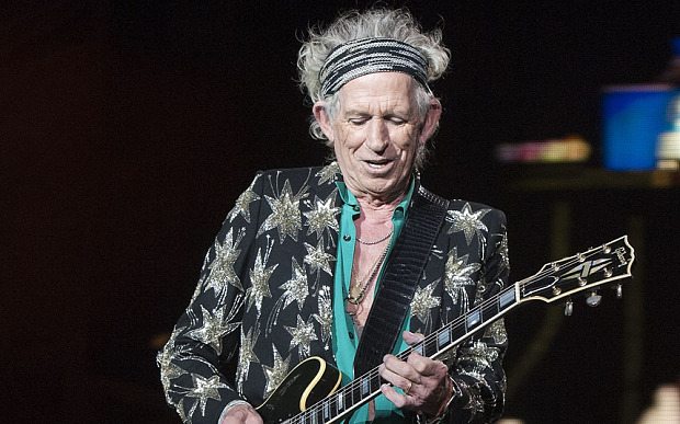 Keith Richards, of the Rolling Stones, performs at Comerica Park, Wednesday, July 8, 2015, in Detroit.  (Daniel Mears/Detroit News via AP)  DETROIT FREE PRESS OUT; HUFFINGTON POST OUT; MANDATORY CREDIT